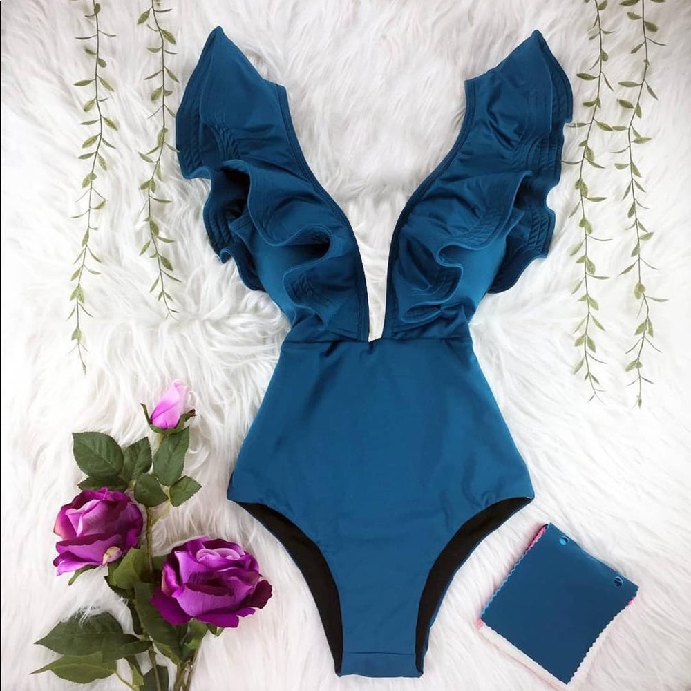 New swimsuit. full body, one piece. Color teal/ aqua. size L